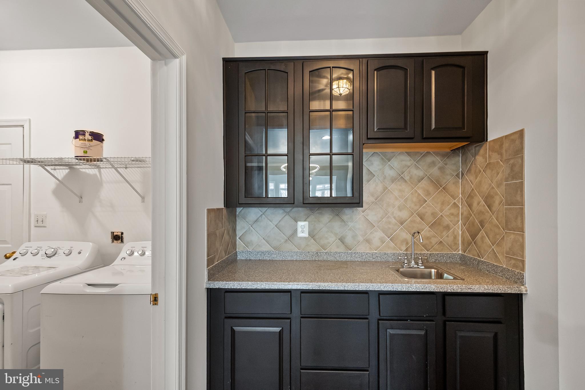 9015 Helmsley Drive Clinton, MD 20735 - Photo 13 of 53 a bathroom with a sink and a mirror
