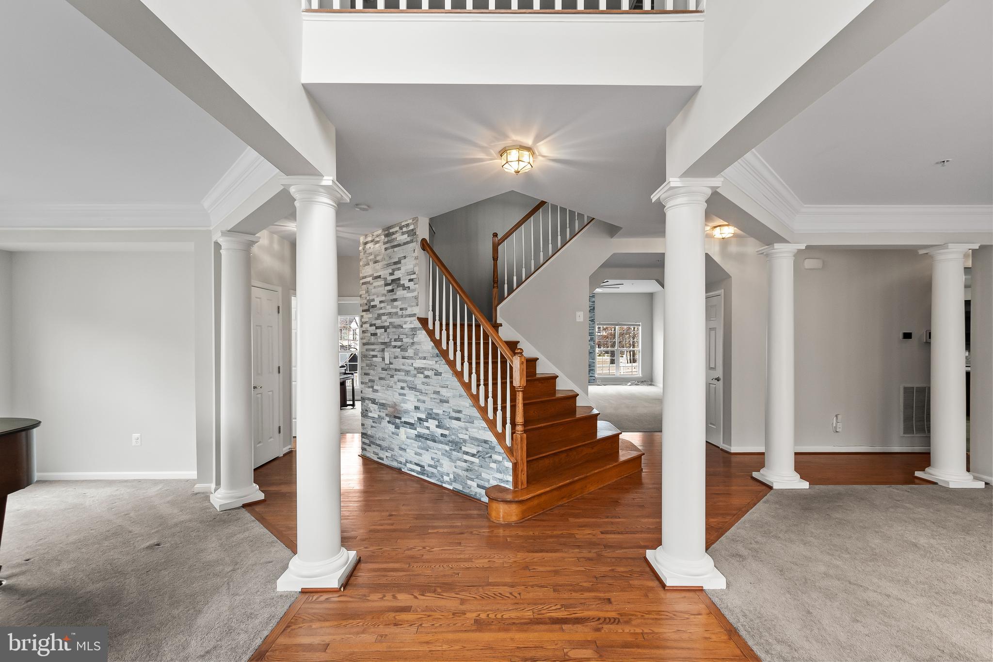 9015 Helmsley Drive Clinton, MD 20735 - Photo 3 of 53 a view of entryway and hall with wooden floor