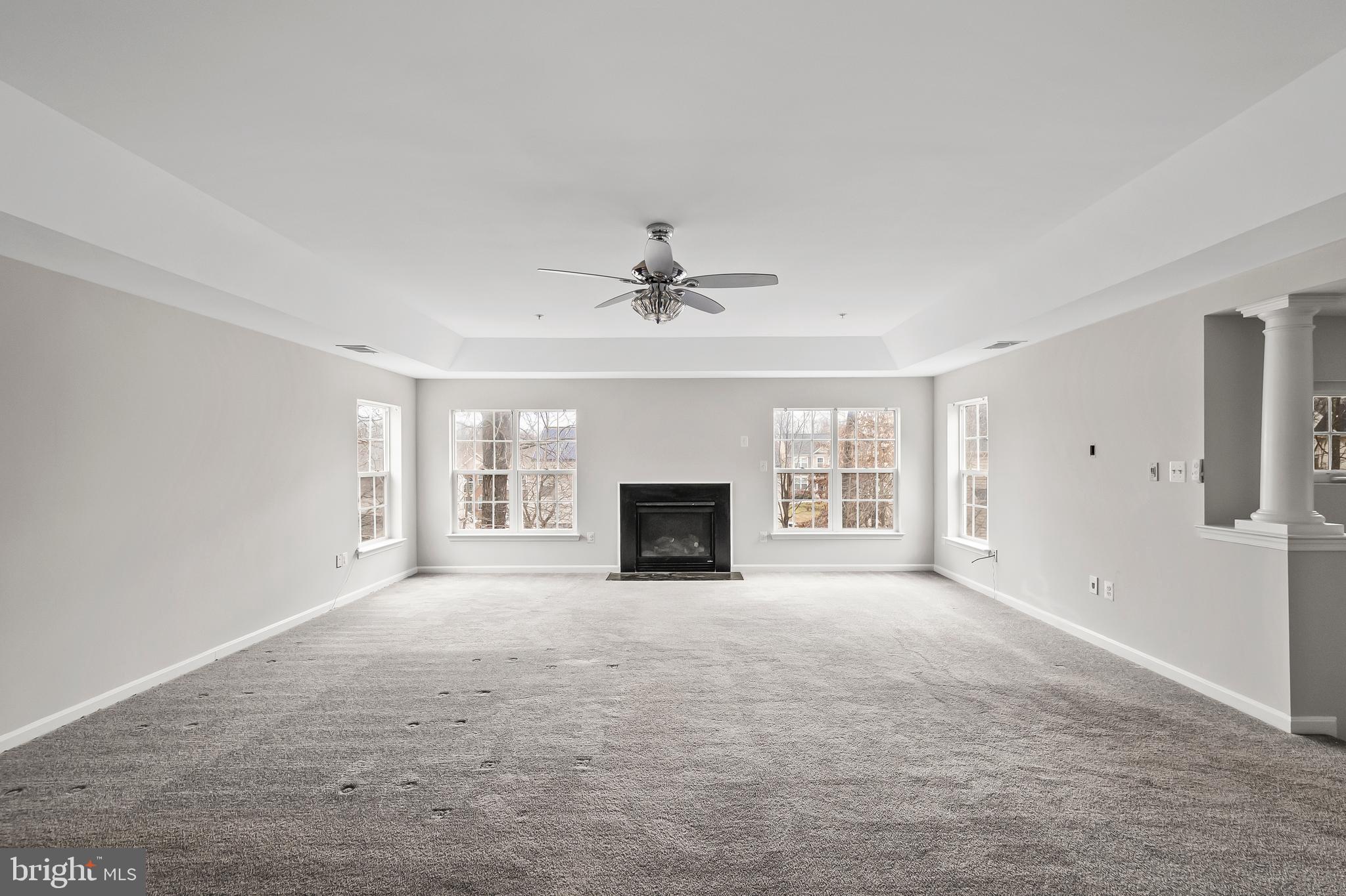 9015 Helmsley Drive Clinton, MD 20735 - Photo 33 of 53 a view of a livingroom with a fireplace and a window