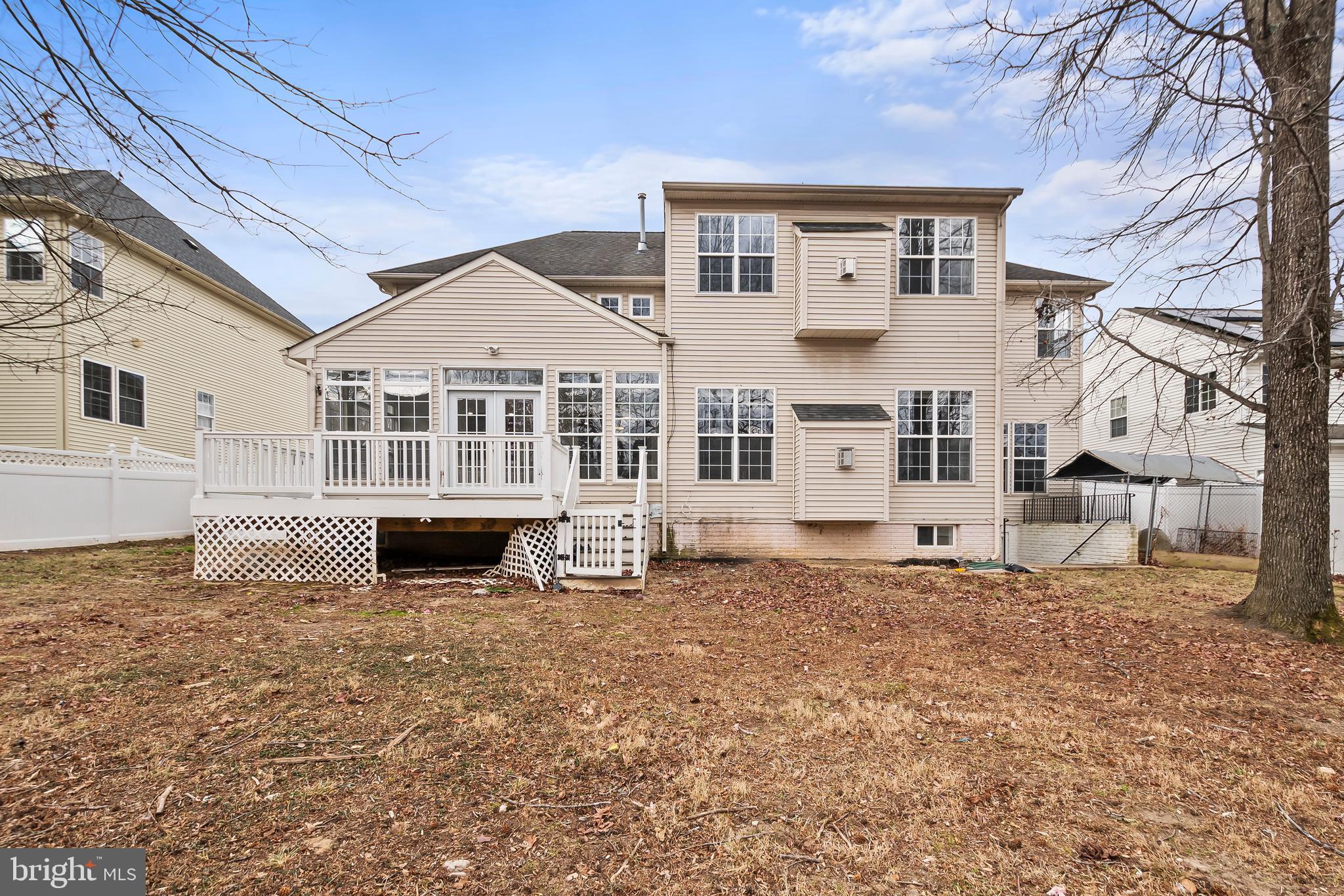 9015 Helmsley Drive Clinton, MD 20735 - Photo 49 of 53 a front view of a house with a yard