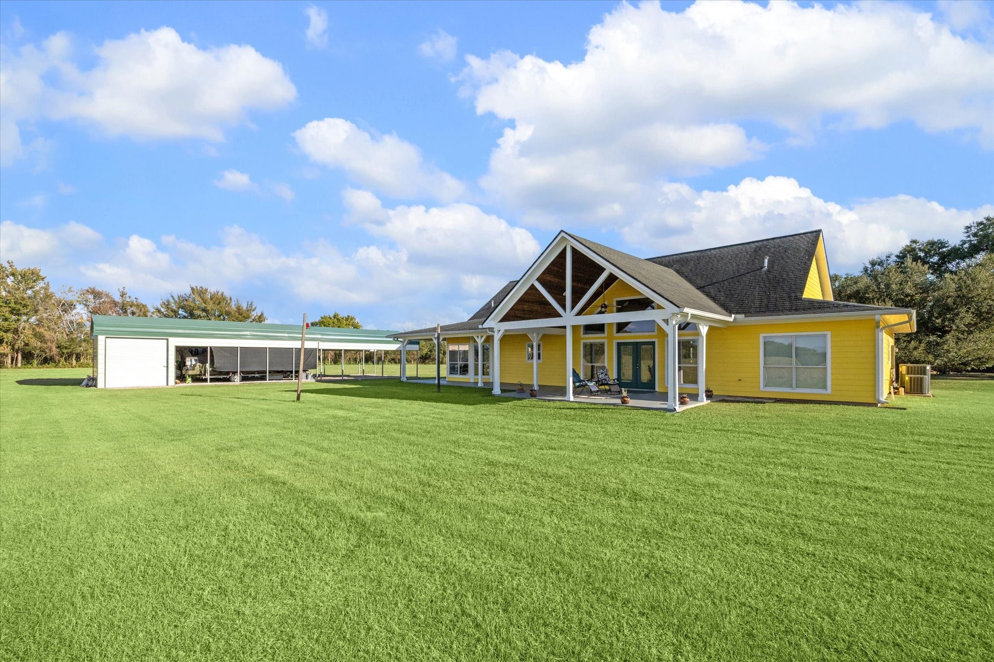 32410 Phlying Road Waller, TX 77484 - Photo 20 of 26 a front view of a house with garden