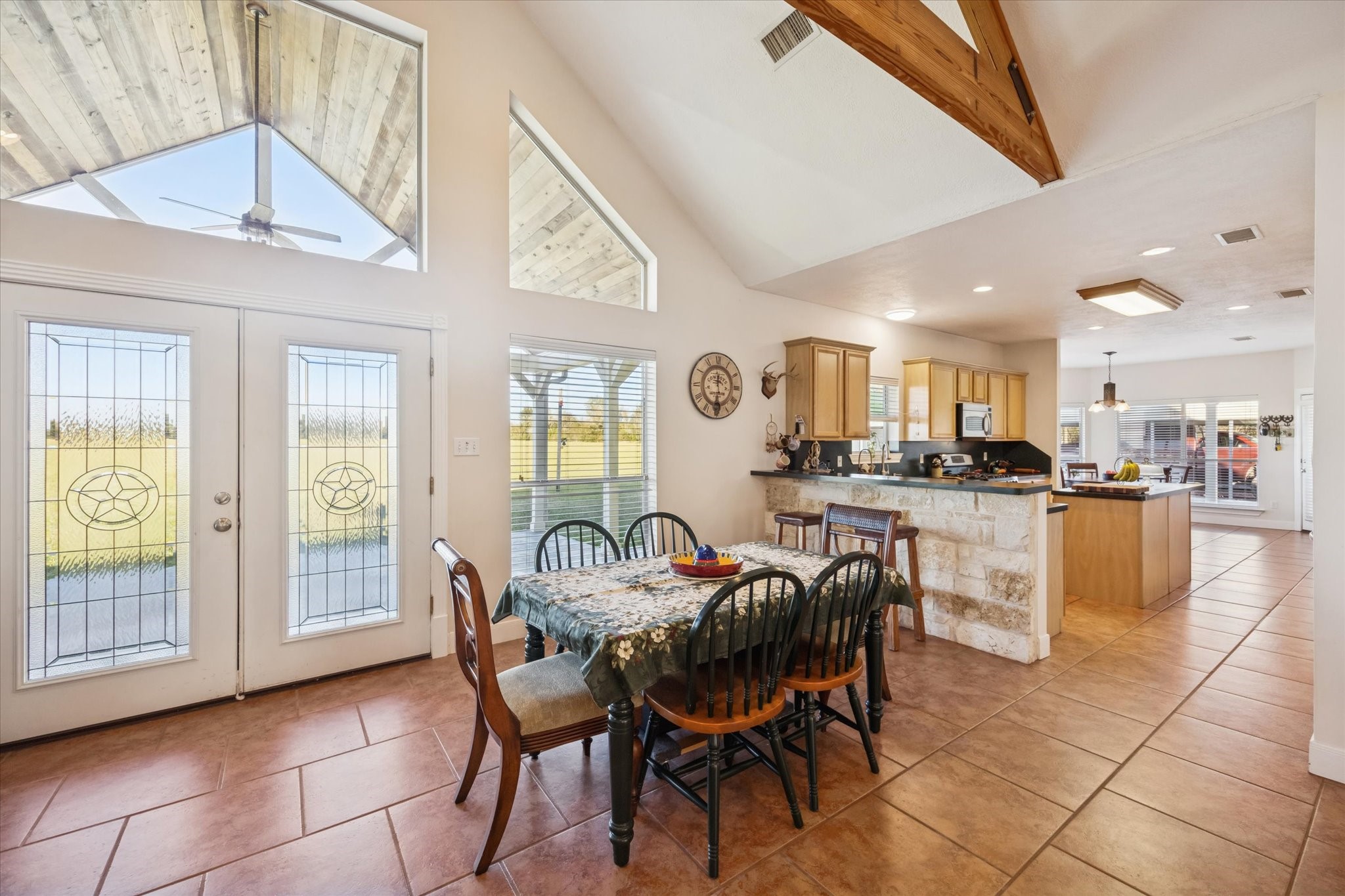 32410 Phlying Road Waller, TX 77484 - Photo 3 of 26 a dining room with furniture and a view of kitchen