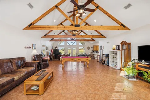 a room with furniture and a large window