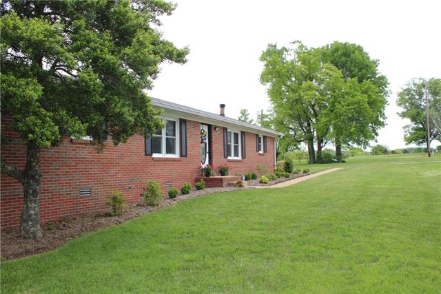 Front view of home situated on 7.93+/- acres