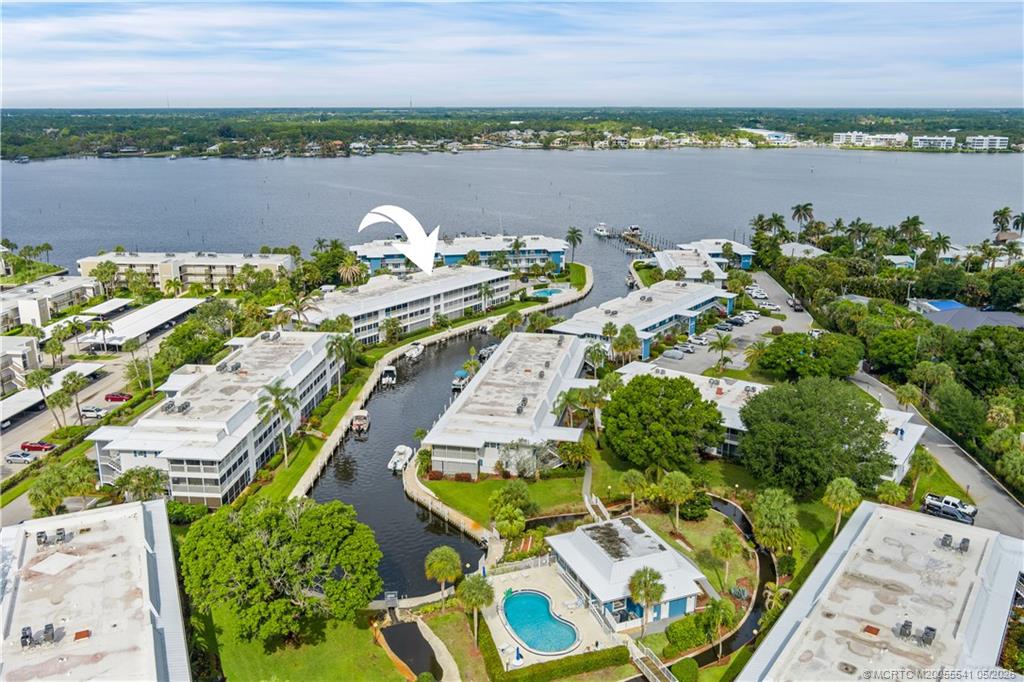 1866 Southwest Palm City Road, Unit 204 Stuart, FL 34994 - Photo 3 of 38 a view of a lake with outdoor space