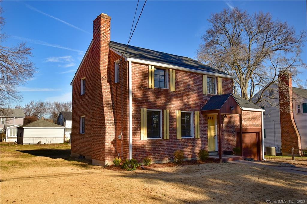 40 Belcher Road Wethersfield, CT 06109 - Photo 1 of 1 a view of a building with a street