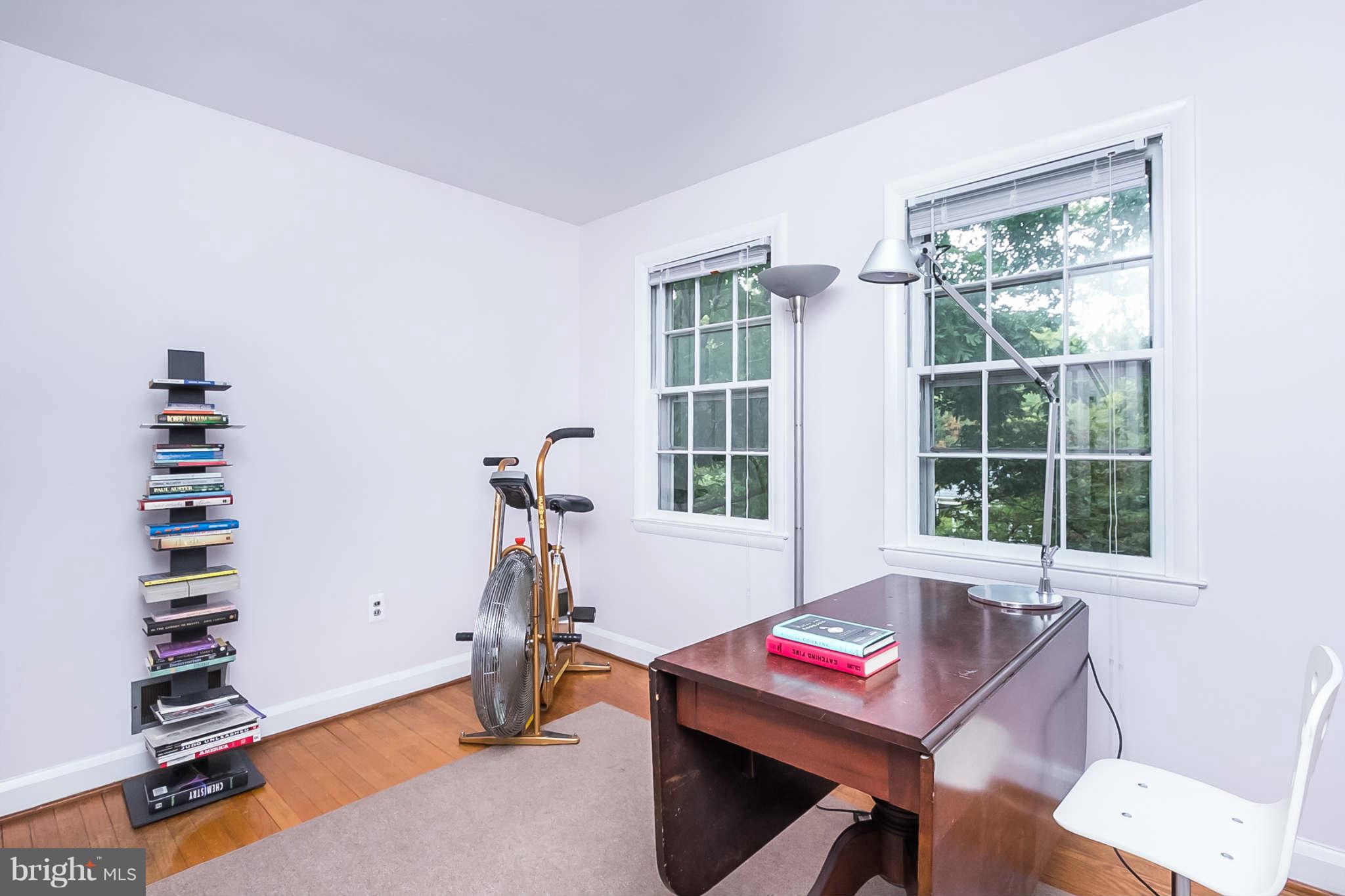 4819 Keswick Road Baltimore, MD 21210 - Photo 18 of 28 a bedroom with furniture and a window