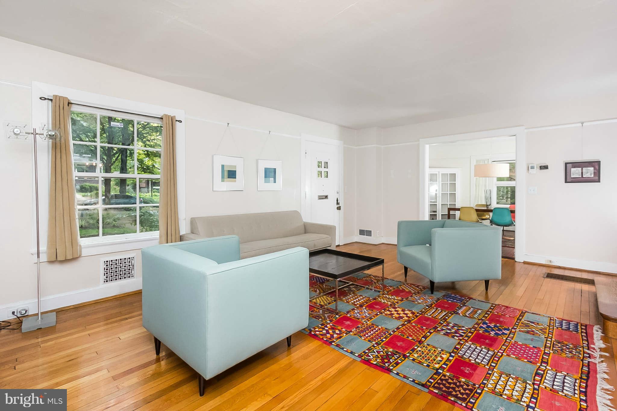 4819 Keswick Road Baltimore, MD 21210 - Photo 3 of 28 a living room with furniture and a rug
