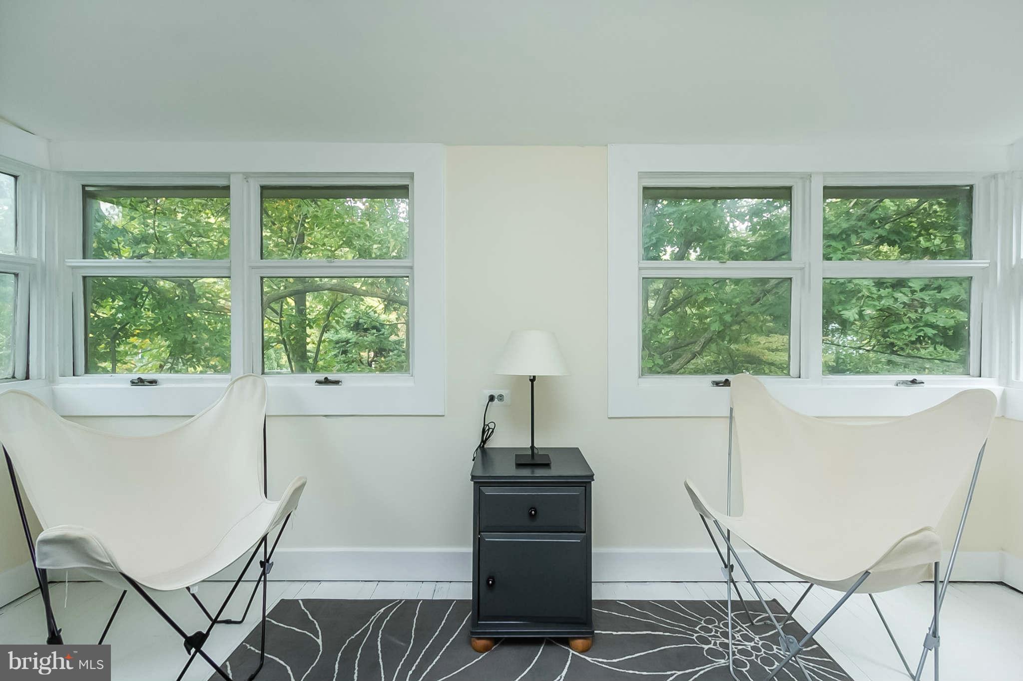 4819 Keswick Road Baltimore, MD 21210 - Photo 24 of 28 a view of a dining room with furniture window and outside view