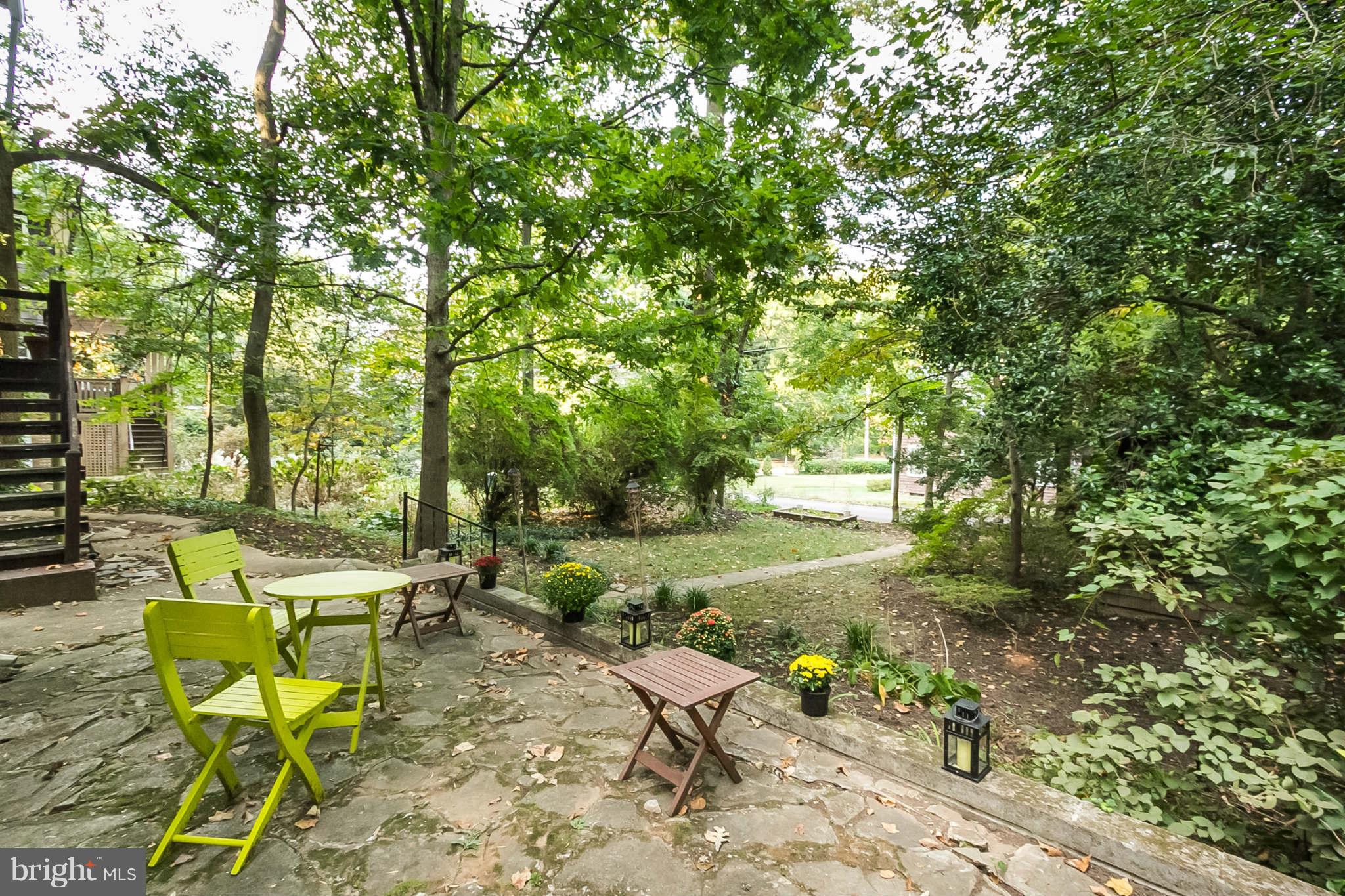 4819 Keswick Road Baltimore, MD 21210 - Photo 28 of 28 a view of a patio with table and chairs and potted plants