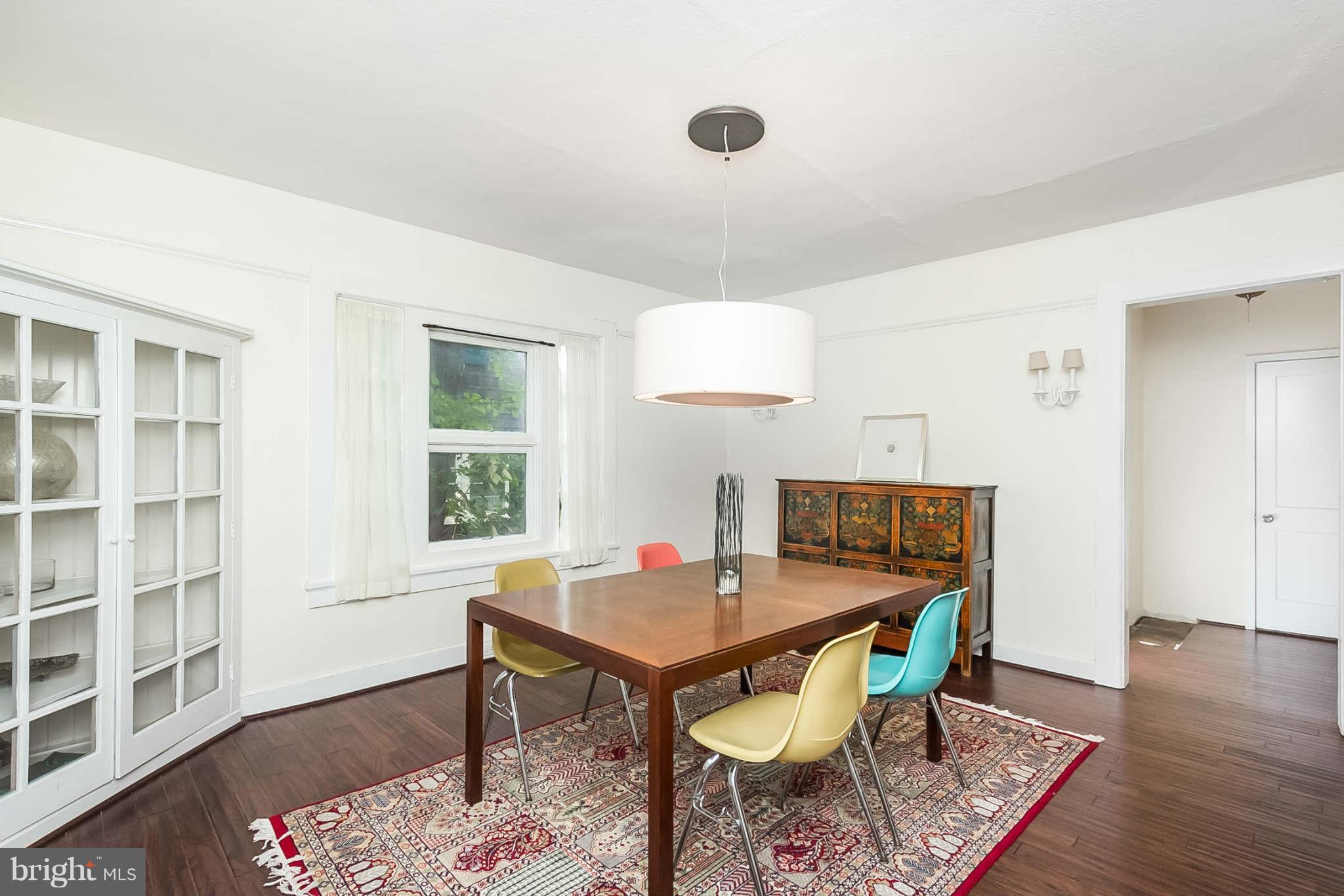 4819 Keswick Road Baltimore, MD 21210 - Photo 8 of 28 a workspace with furniture and wooden floor