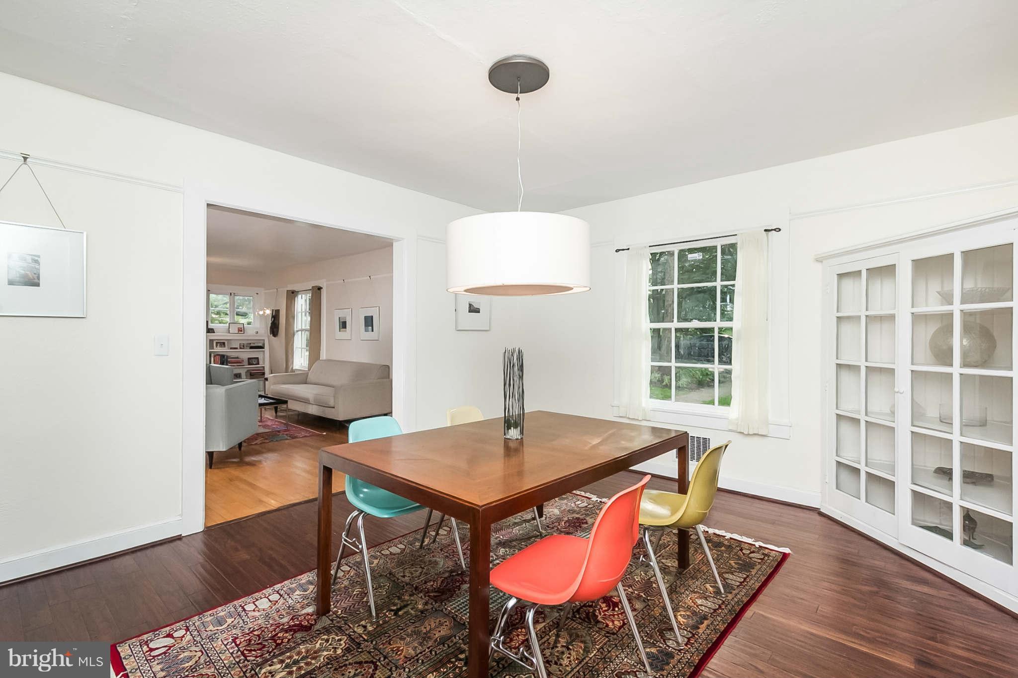 4819 Keswick Road Baltimore, MD 21210 - Photo 10 of 28 a view of a dining room with furniture and wooden floor