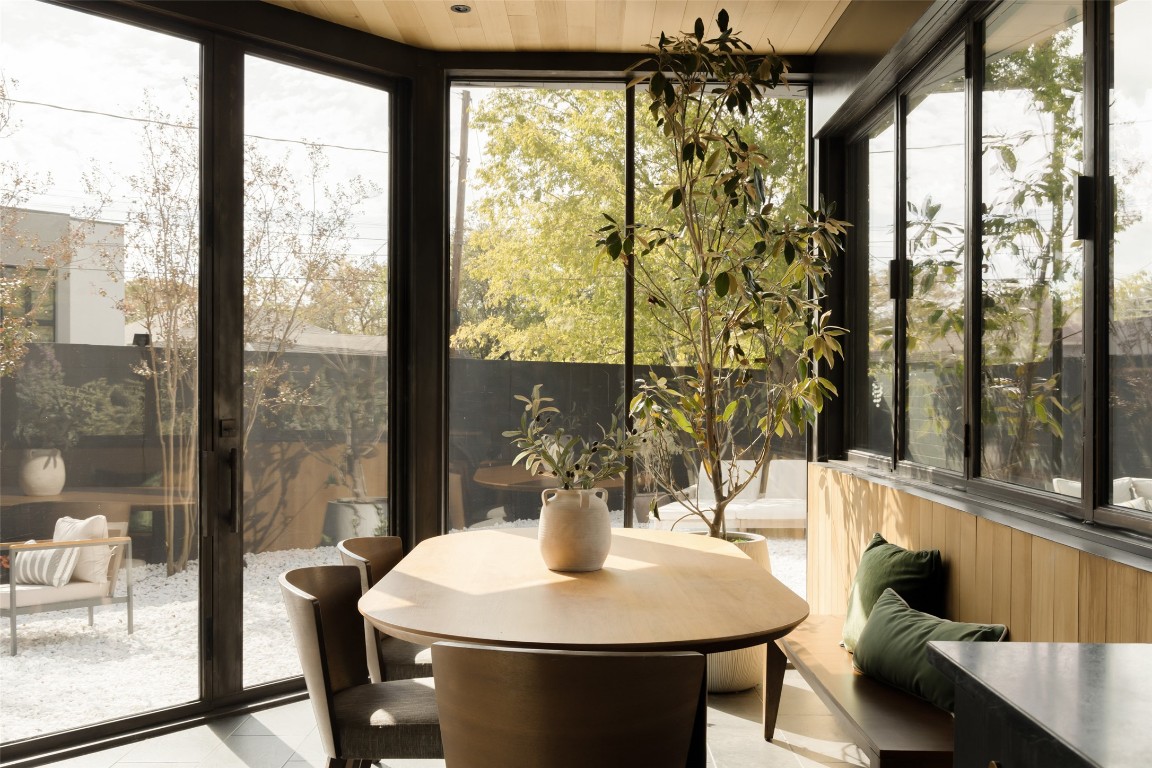 2302 East 11th Street Austin, TX 78702 - Photo 12 of 40 a dining room with furniture window and outside view