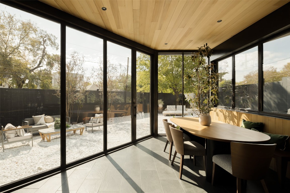 2302 East 11th Street Austin, TX 78702 - Photo 13 of 40 a view of a city from a dining room with a large window