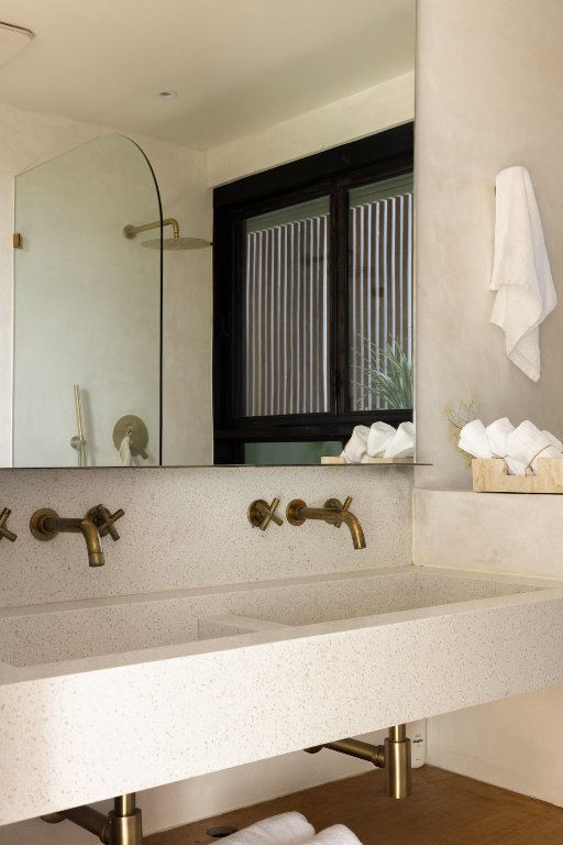 2302 East 11th Street Austin, TX 78702 - Photo 23 of 40 a bathroom with a sink and a mirror