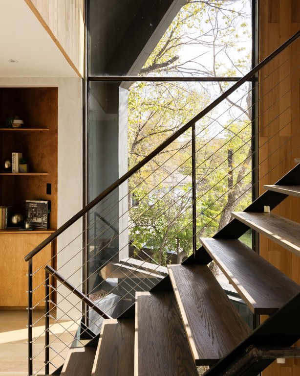 2302 East 11th Street Austin, TX 78702 - Photo 28 of 40 a view of a floor to ceiling window with wooden floor