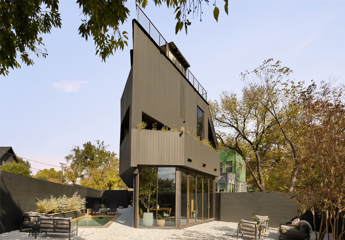 2302 East 11th Street Austin, TX 78702 - Photo 38 of 40 a view of a street with house in the background