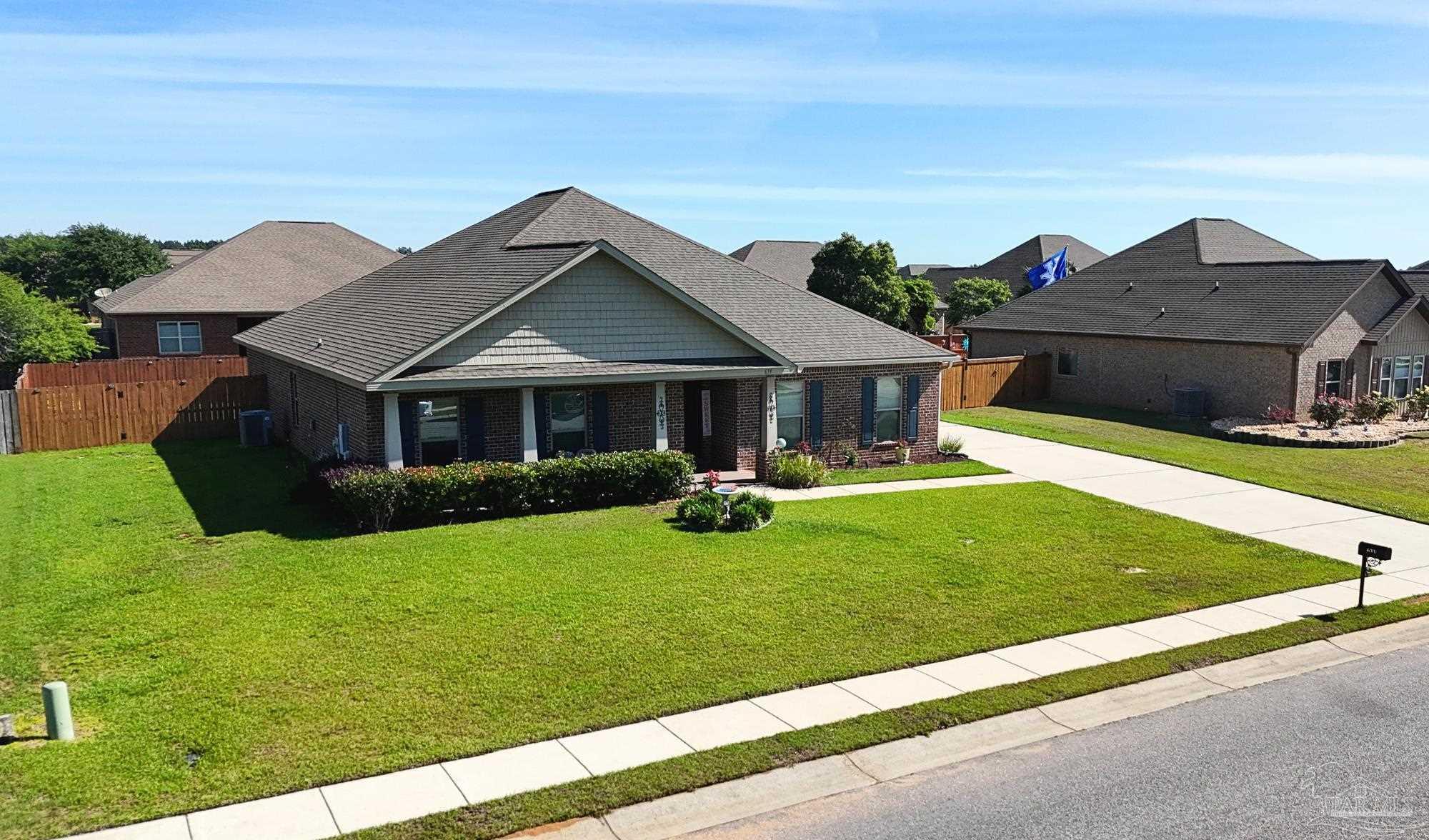 633 Harahan Lane Foley, AL 36535 - Photo 2 of 57 a front view of a house with garden