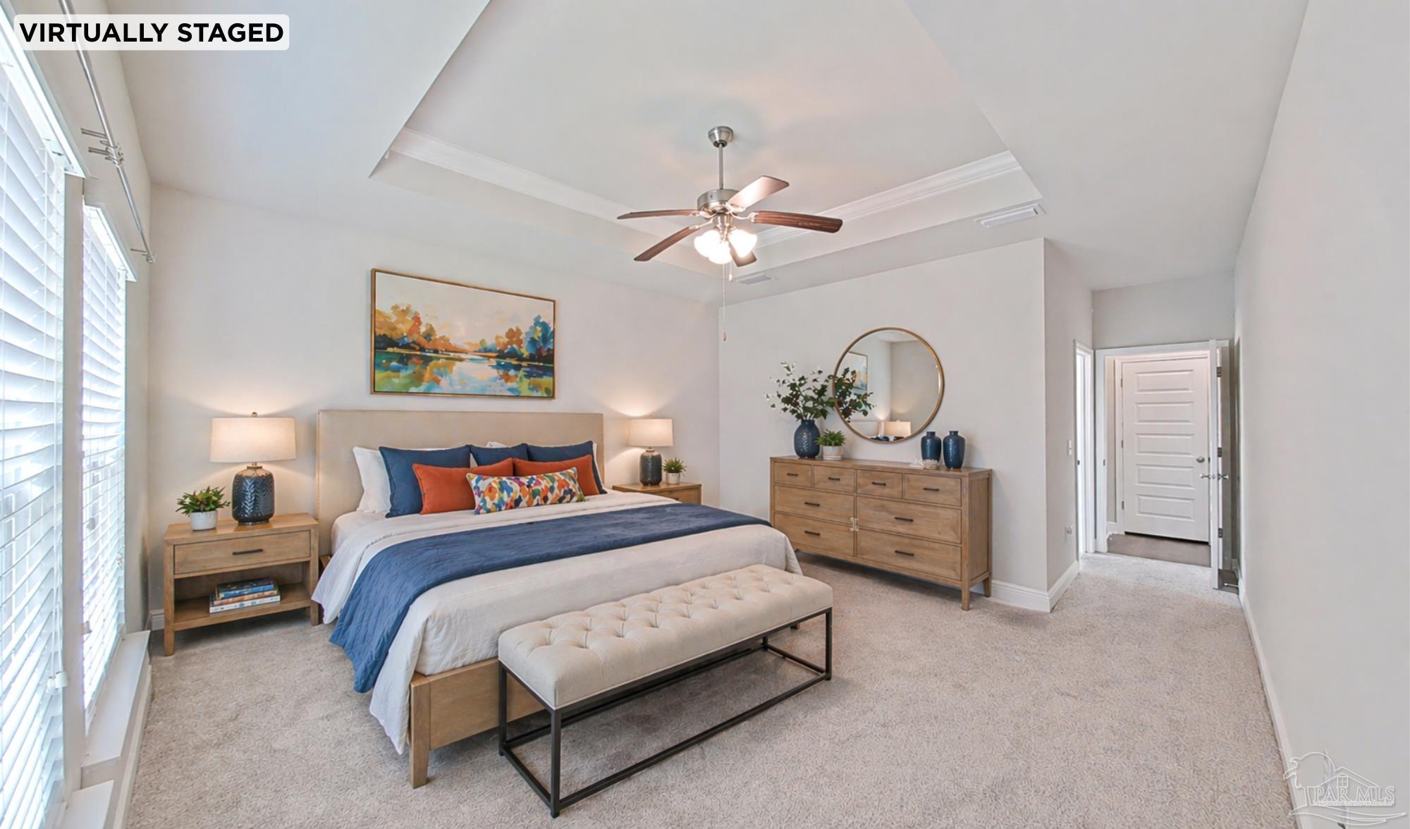 633 Harahan Lane Foley, AL 36535 - Photo 22 of 57 a bedroom with bed and a chandelier