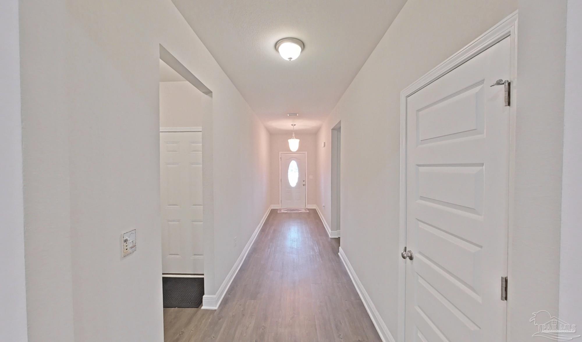 633 Harahan Lane Foley, AL 36535 - Photo 28 of 57 a view of a hallway with wooden floor