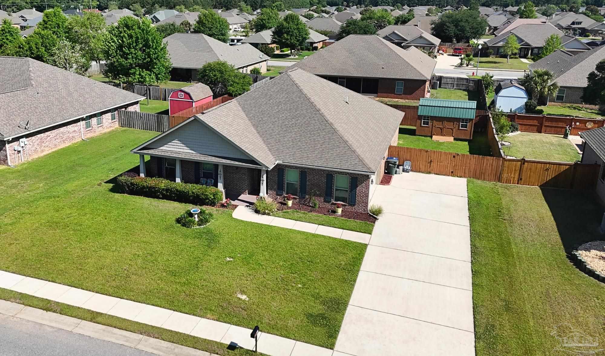 633 Harahan Lane Foley, AL 36535 - Photo 3 of 57 an aerial view of a house with swimming pool and patio