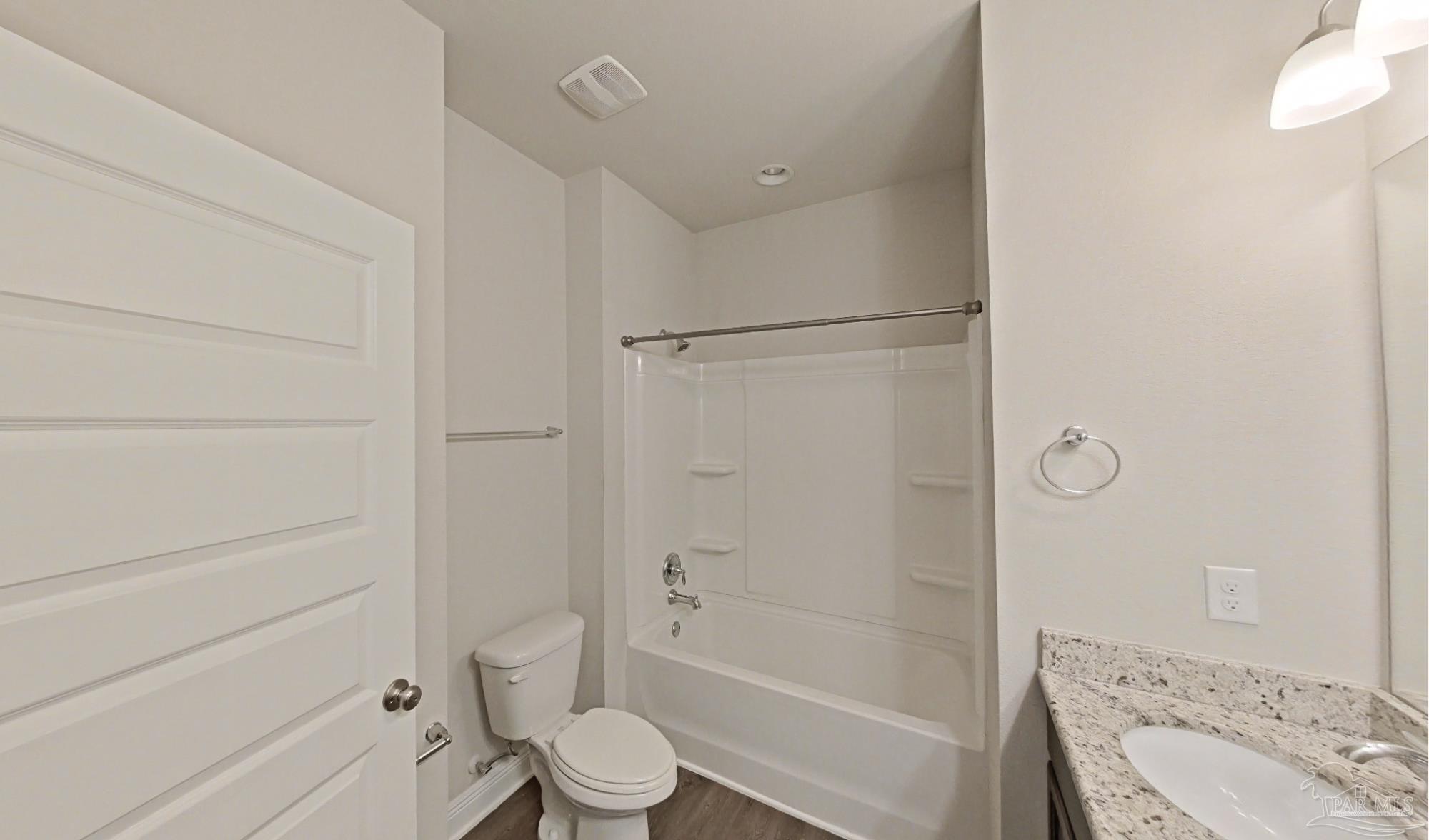 633 Harahan Lane Foley, AL 36535 - Photo 31 of 57 a bathroom with a toilet and a tub