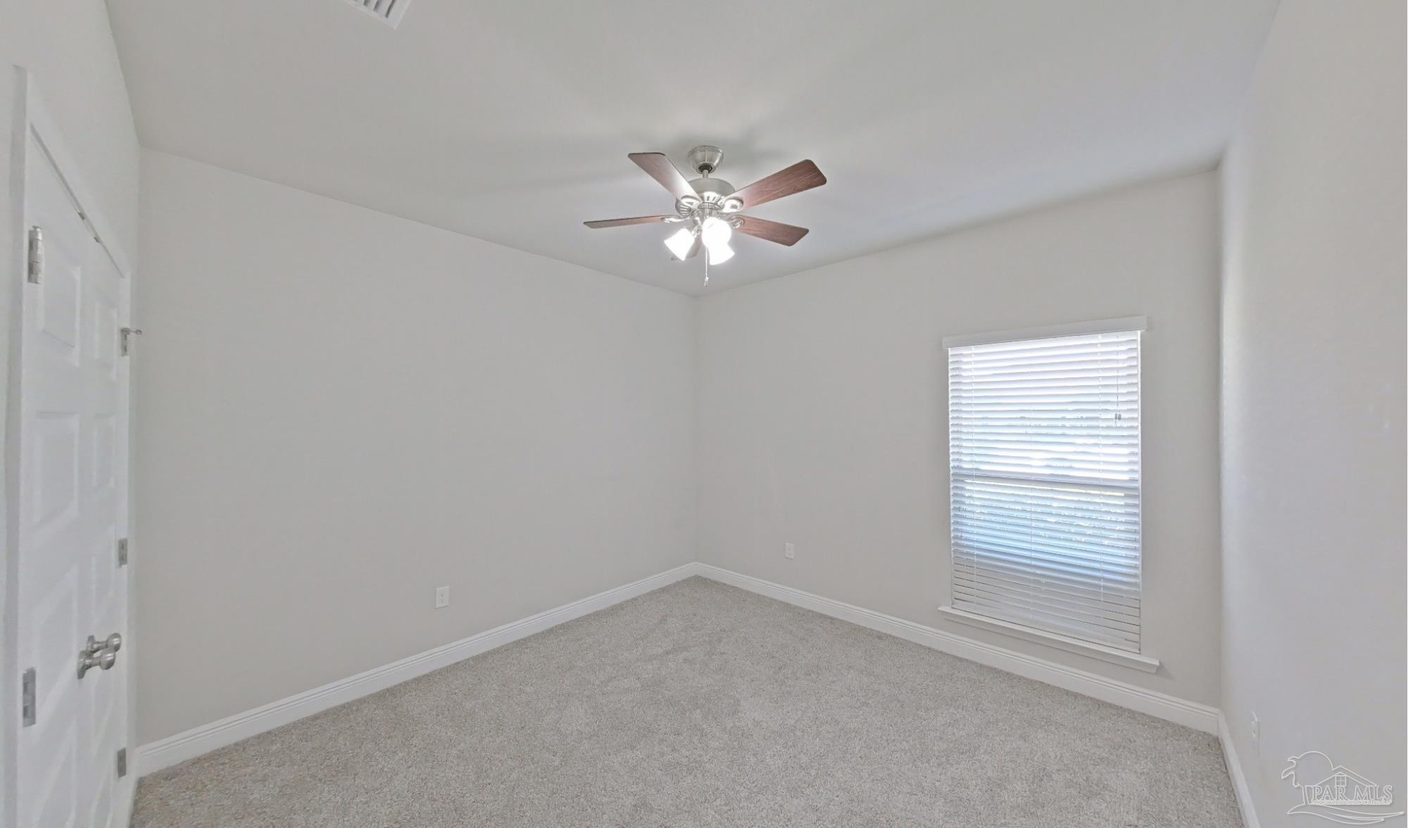 633 Harahan Lane Foley, AL 36535 - Photo 41 of 57 wooden floor in an empty room with a window