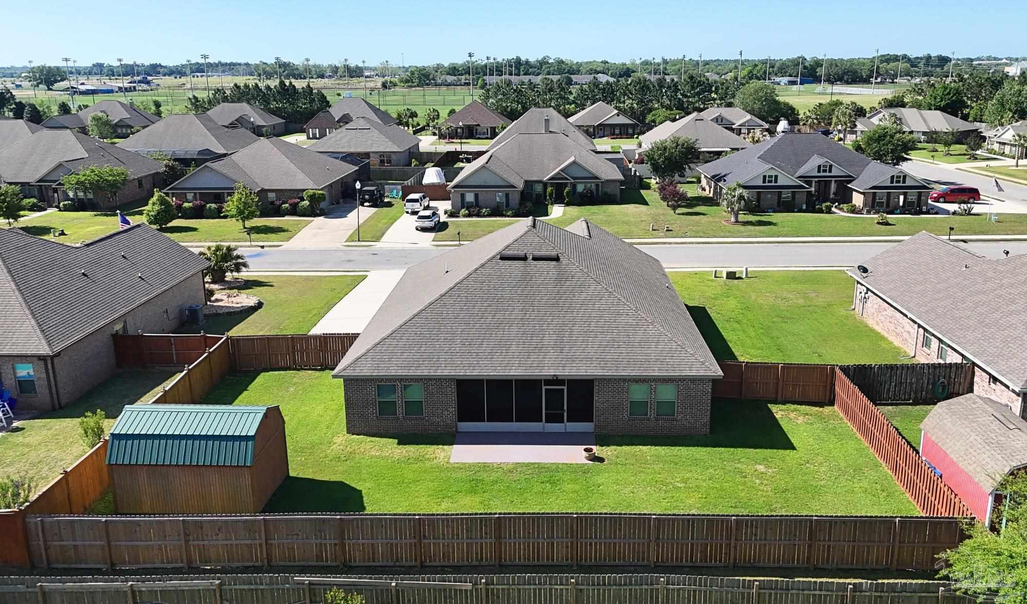 633 Harahan Lane Foley, AL 36535 - Photo 52 of 57 an aerial view of multiple houses with yard