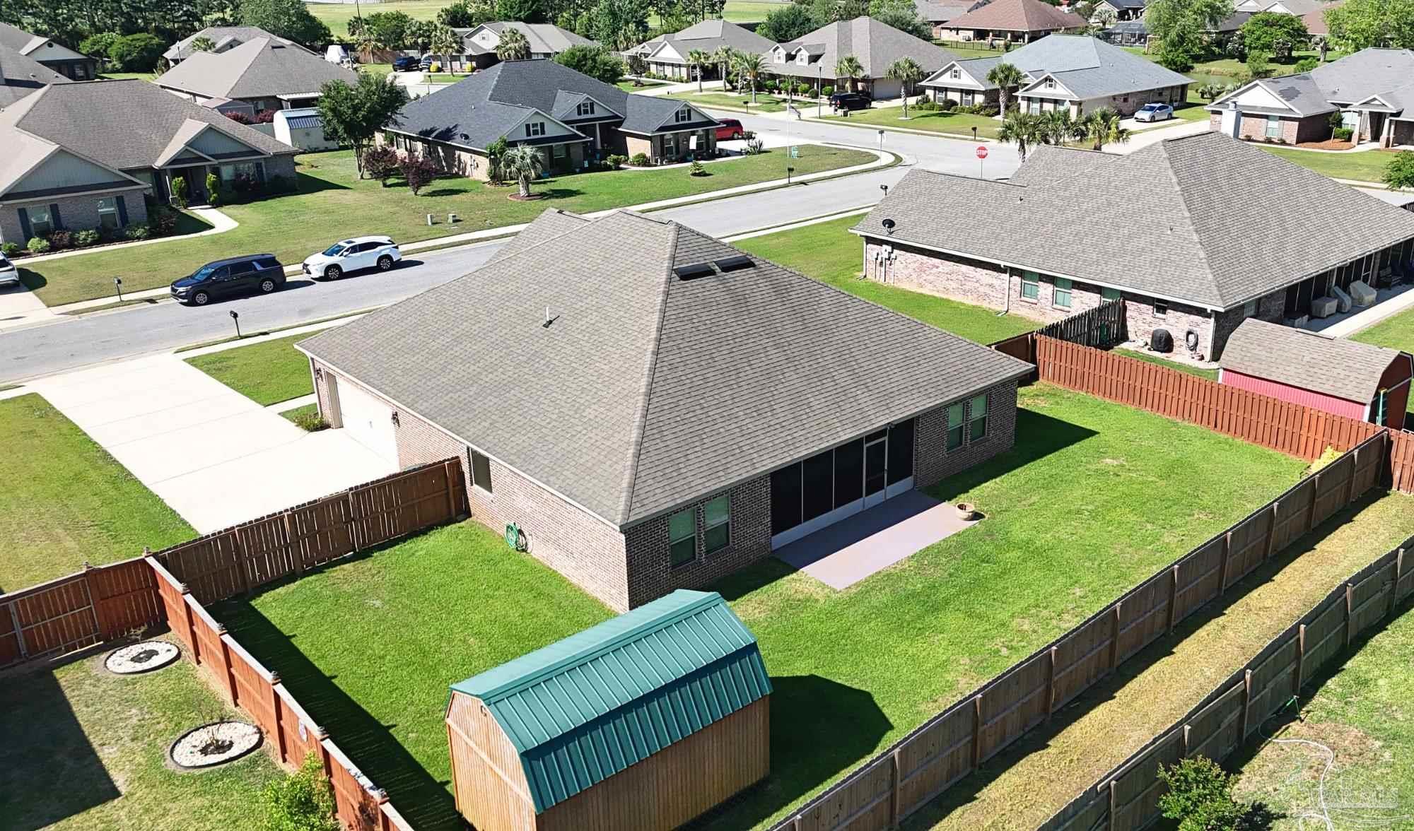 633 Harahan Lane Foley, AL 36535 - Photo 54 of 57 a view of a tennis ground with large trees