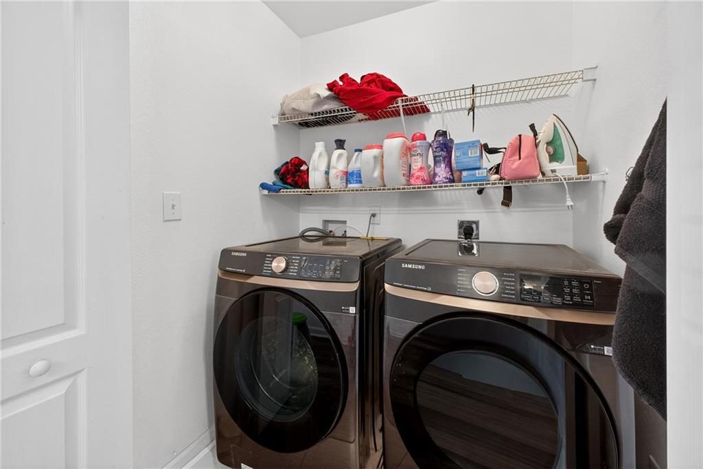 175 Gross Lake Parkway Covington, GA 30016 - Photo 13 of 25 a utility room with dryer and washer