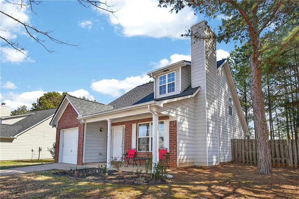 175 Gross Lake Parkway Covington, GA 30016 - Photo 2 of 25 a front view of a house with a yard