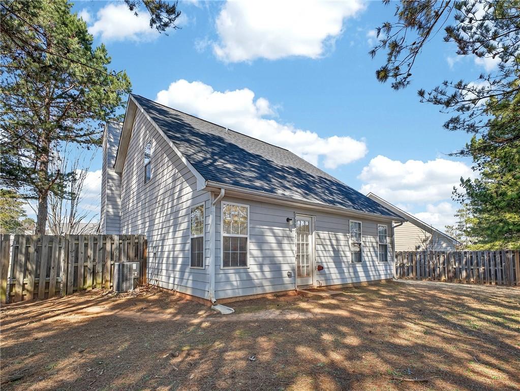 175 Gross Lake Parkway Covington, GA 30016 - Photo 23 of 25 a view of a house with a patio