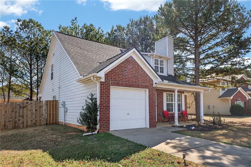 175 Gross Lake Parkway Covington, GA 30016 - Photo 4 of 25 a view of a house with a yard