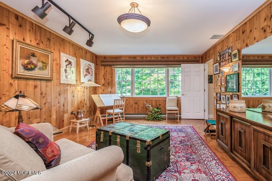 33 Bucks Mill Road Colts Neck, NJ 07722 - Photo 13 of 33 a living room with furniture and a floor to ceiling window