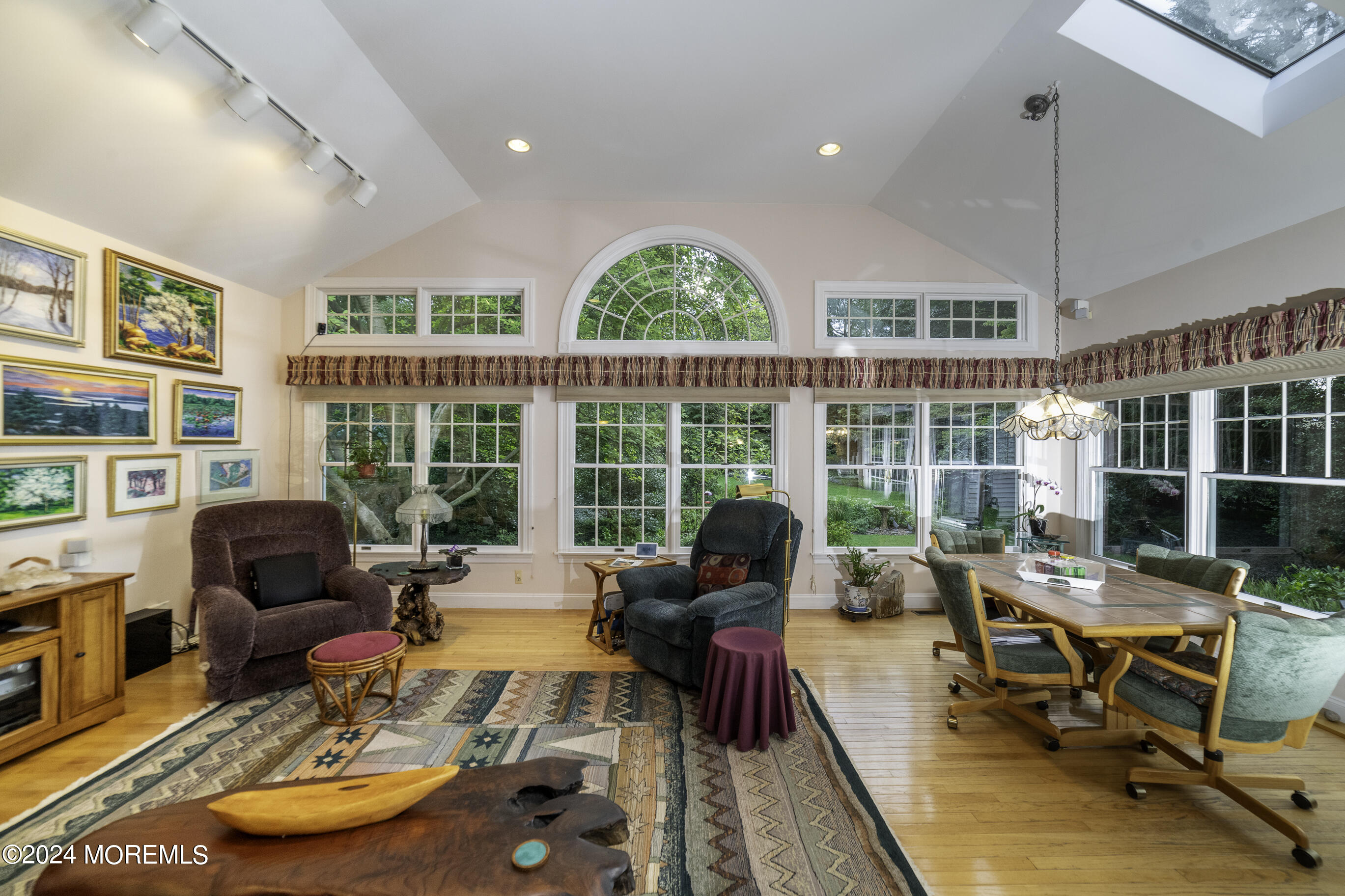 33 Bucks Mill Road Colts Neck, NJ 07722 - Photo 9 of 33 a living room with furniture a rug and a large window