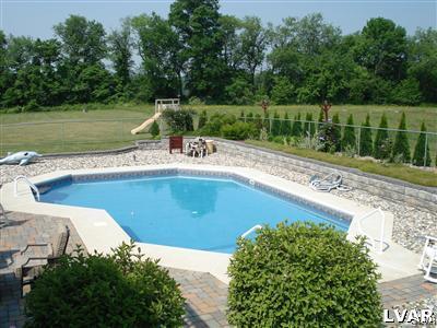 231 Kellington Road Wind Gap, PA 18091 - Photo 11 of 48 a view of a swimming pool with a yard