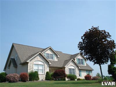 231 Kellington Road Wind Gap, PA 18091 - Photo 2 of 48 a front view of a house with a garden