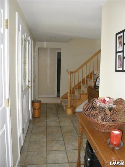 231 Kellington Road Wind Gap, PA 18091 - Photo 29 of 48 a view of a hallway to a livingroom with furniture
