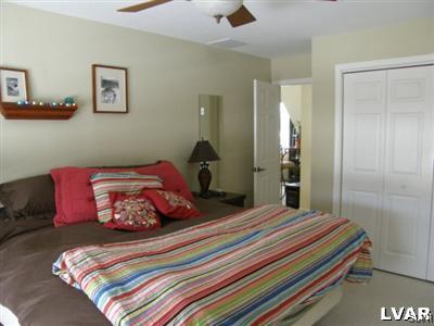 231 Kellington Road Wind Gap, PA 18091 - Photo 42 of 48 a bedroom with a bed and a painting on the wall