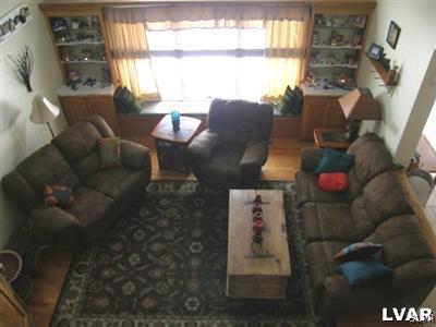 231 Kellington Road Wind Gap, PA 18091 - Photo 45 of 48 a living room with furniture and a floor to ceiling window