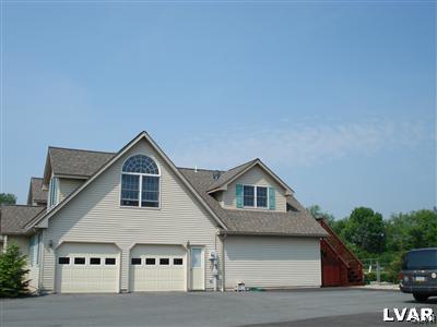 231 Kellington Road Wind Gap, PA 18091 - Photo 5 of 48 a front view of a house with parking