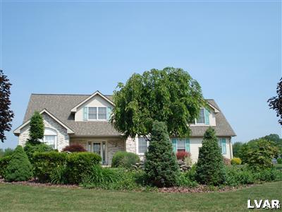 231 Kellington Road Wind Gap, PA 18091 - Photo 7 of 48 a house with a tree in front of it