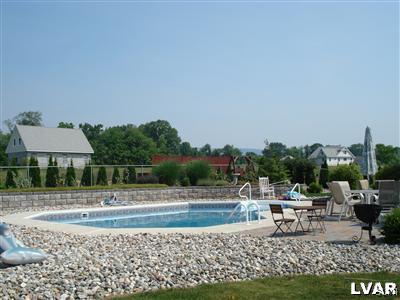 231 Kellington Road Wind Gap, PA 18091 - Photo 8 of 48 a view of a lake with outdoor space