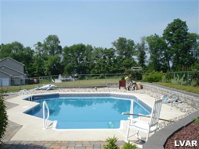 231 Kellington Road Wind Gap, PA 18091 - Photo 10 of 48 a view of a swimming pool with a patio