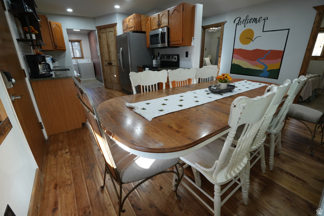 3711 North Canyon Road Provo, UT 84604 - Photo 5 of 42 Dining space featuring plenty of natural light, separate washer and dryer, dark wood finished floors, and recessed lighting