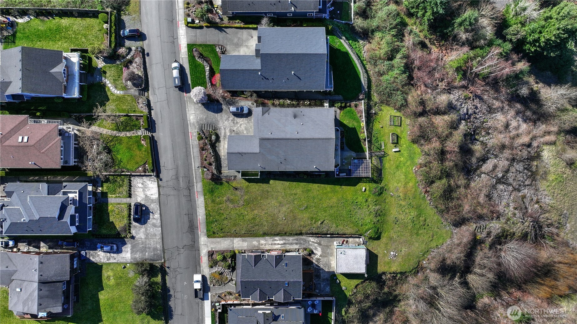 5313 North Commercial Street Ruston, WA 98407 - Photo 11 of 35 an aerial view of multiple houses with outdoor space