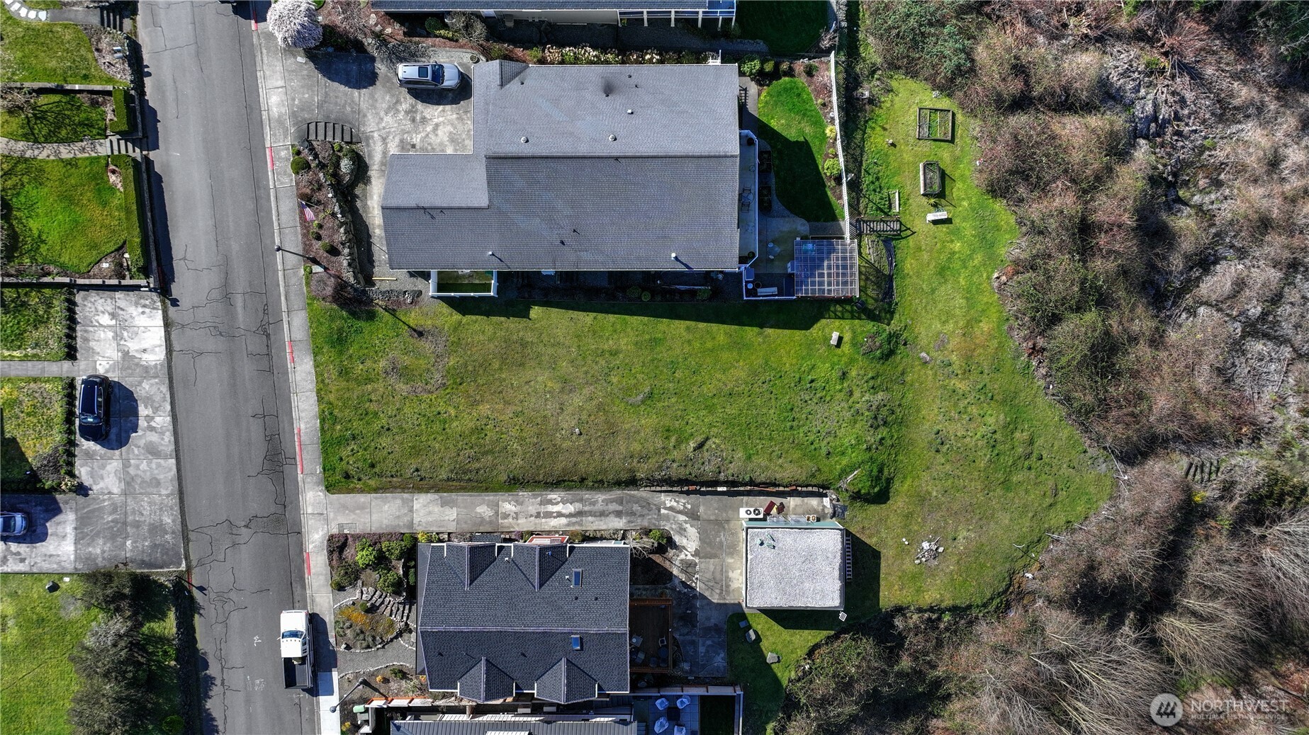 5313 North Commercial Street Ruston, WA 98407 - Photo 12 of 35 an aerial view of a house with a yard