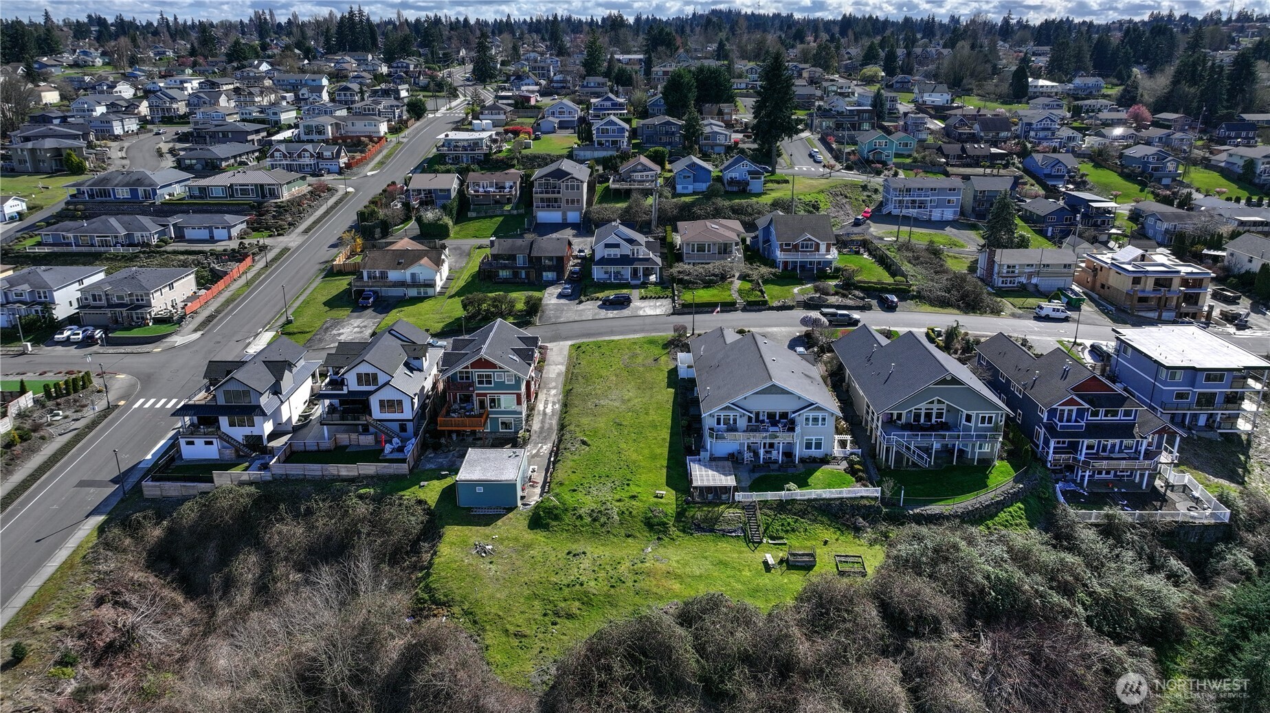 5313 North Commercial Street Ruston, WA 98407 - Photo 14 of 35 an aerial view of multiple houses
