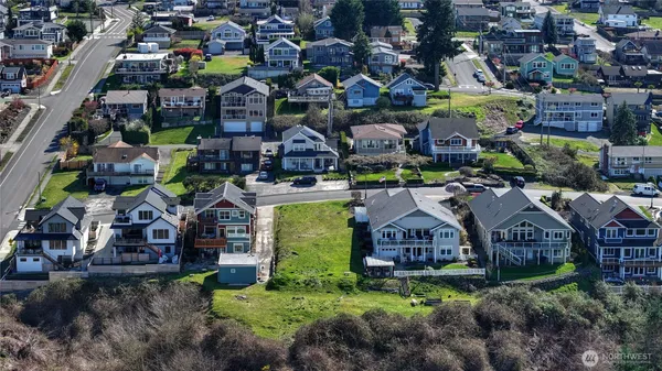 a view of a town with an ocean view