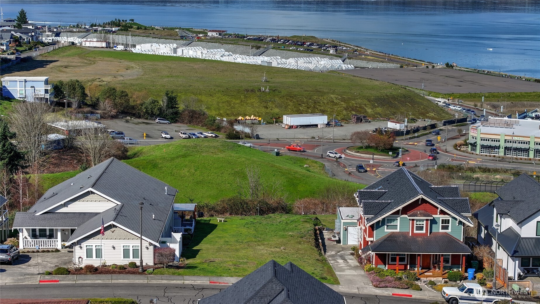5313 North Commercial Street Ruston, WA 98407 - Photo 21 of 35 a view of a town with an ocean view